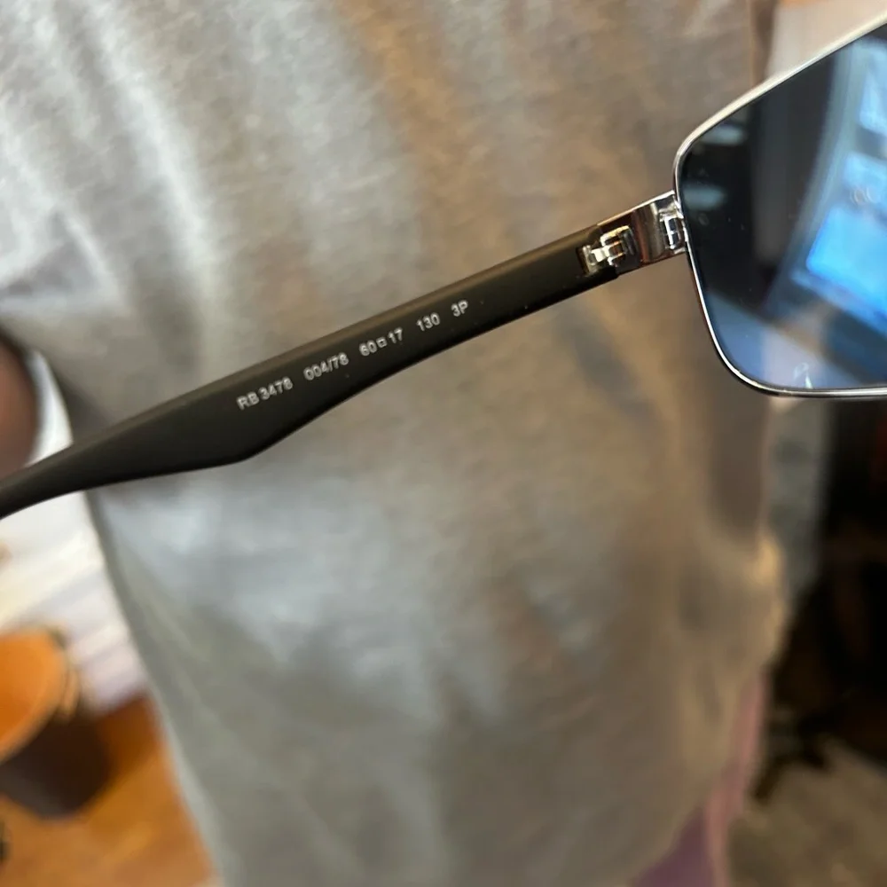 Ray-Ban Black Frame Sunglasses with Grey Lenses